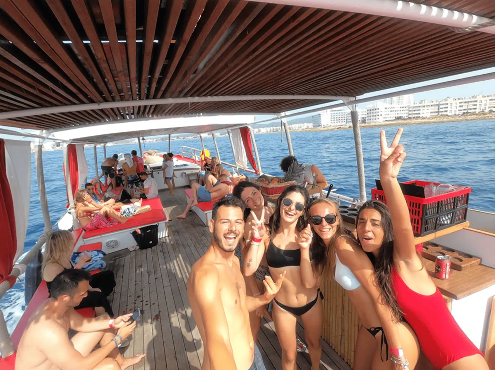 Captain and guests enjoying boat trip Ibiza