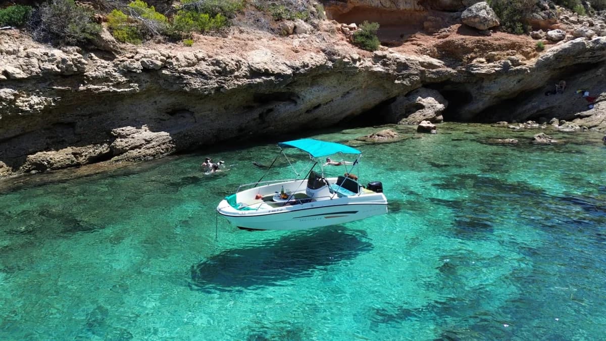 Quicksilver Thunder cruising Ibiza west coast